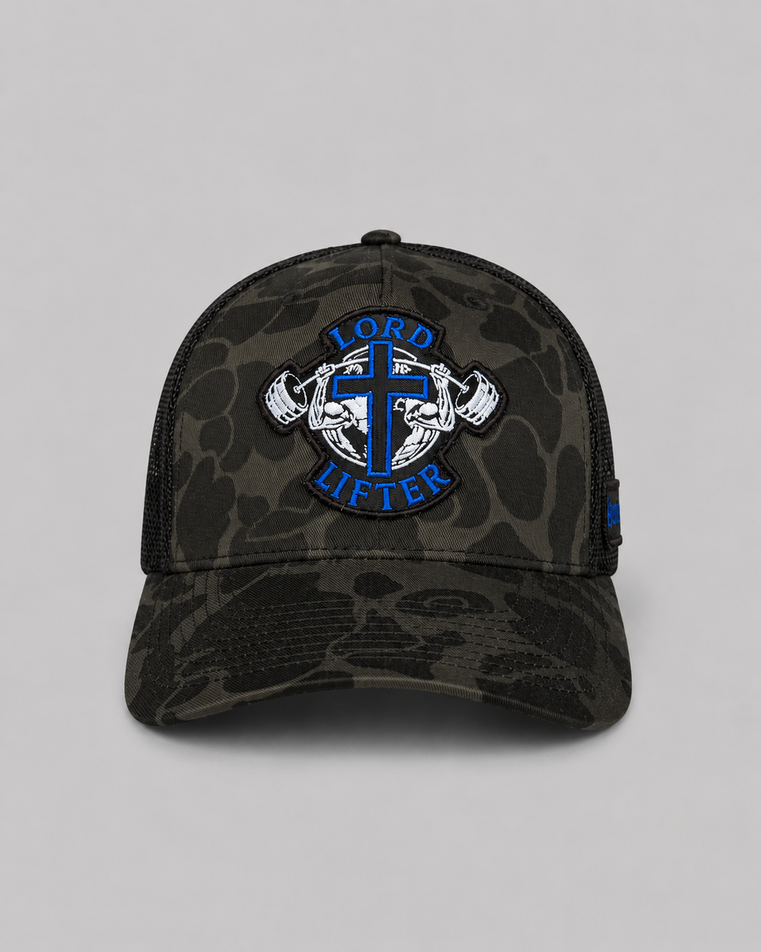 STRENGTH BY FAITH Camouflage Trucker Hat