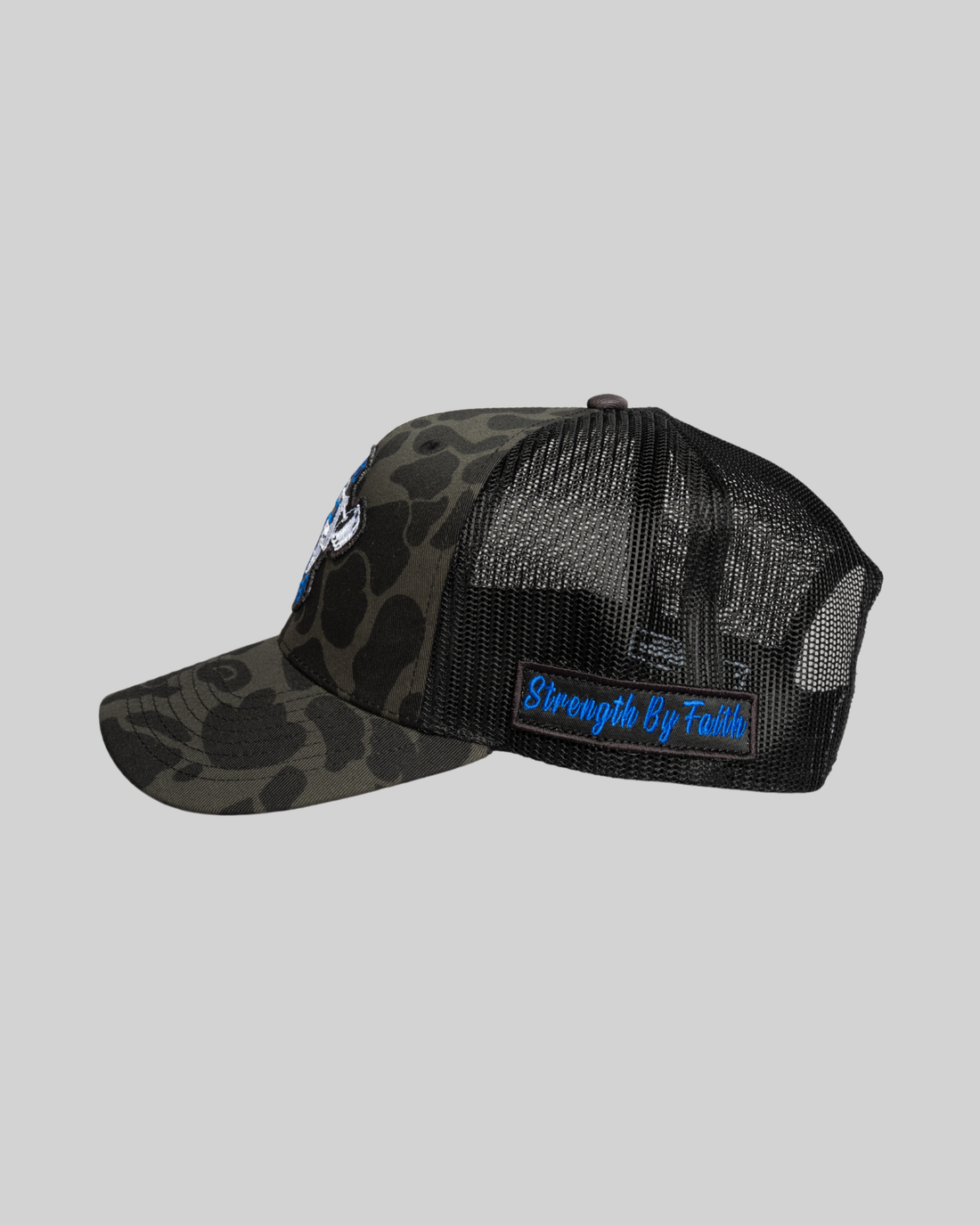 STRENGTH BY FAITH Camouflage Trucker Hat